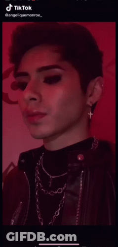 TikTok Video Of Woman Face With Blue Background GIF