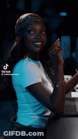 TikTok Video Of Woman With Bandana GIF