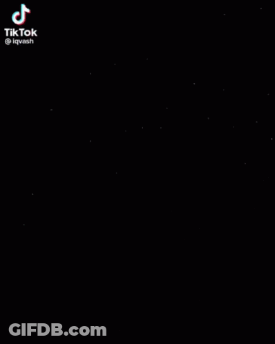 TikTok Video With Dark Background And Purple Heart GIF