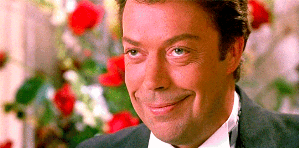 Tim Curry Has A Grinch Smile GIF