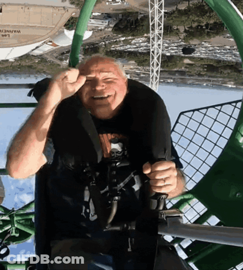Tim Walz Riding Amusement Park Ride GIF