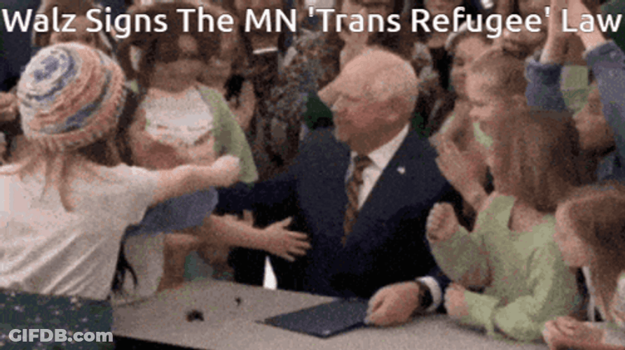 Tim Walz Signs The Law GIF