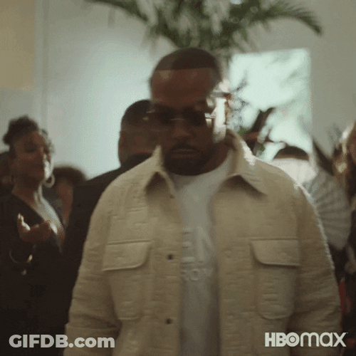 Timbaland Talking To Someone While Walking GIF