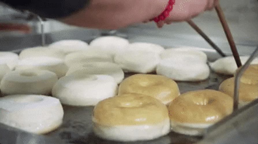 Time To Make The Donuts Frying The Dough GIF