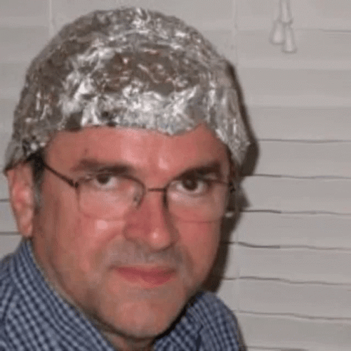 Tin Foil Hat Worn By Conspiracy Theorists GIF