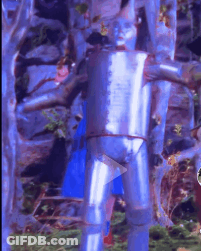 Tin Man Painting With Play Button GIF