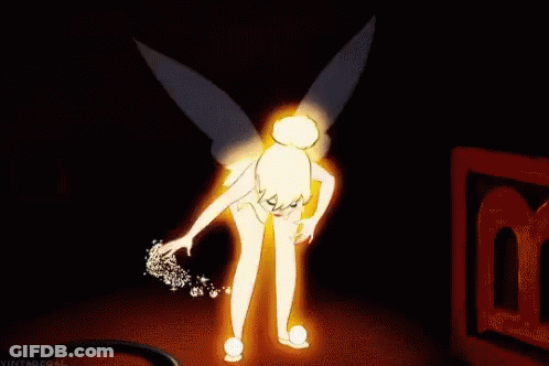 Tinkerbell Holding Fairy Wand In Dark Room GIF