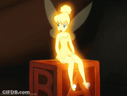 Tinkerbell Sitting On Block With Letter R GIF