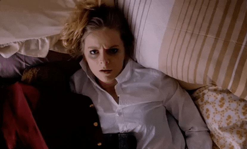 Tired Alice Foulcher Laying On Bed GIF