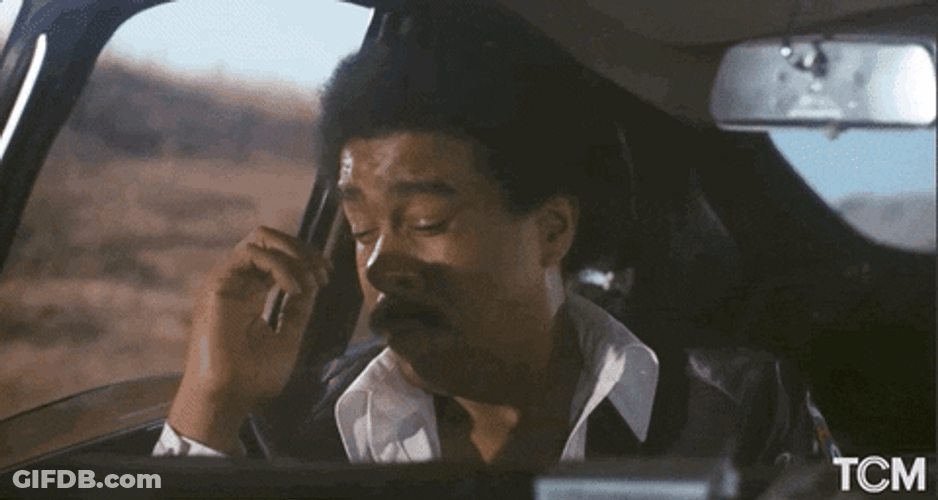 Tired Richard Pryor Yawning In Car Seat GIF