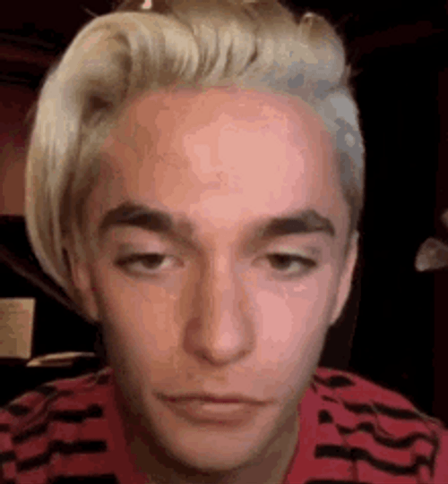 Tired White Guy Blinking GIF
