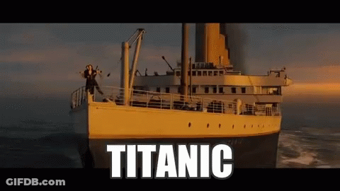 Titanic Floating In Ocean With Woman On Deck GIF