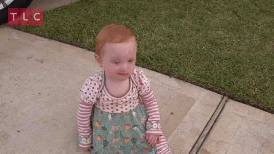TLC Adorable Kid Winky Face GIF