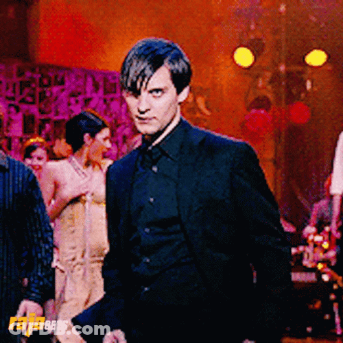 Tobey Maguire Taking Off Suit GIF