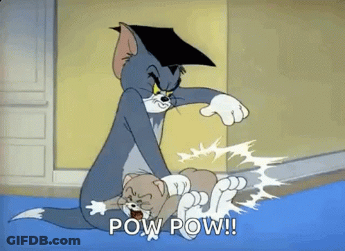 Tom And Jerry Are Fighting And Tom Is Wearing A Graduation Cap And Holding Jerry . GIF