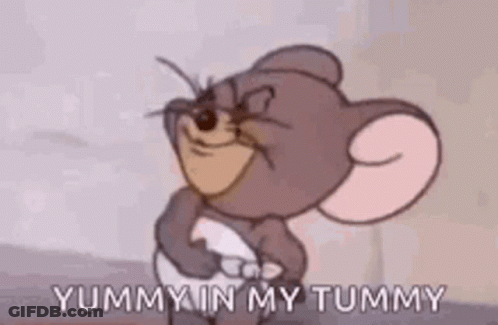 Tom And Jerry Are Standing Next To Each Other And Yummy In My Tummy Is Written On The Screen . GIF