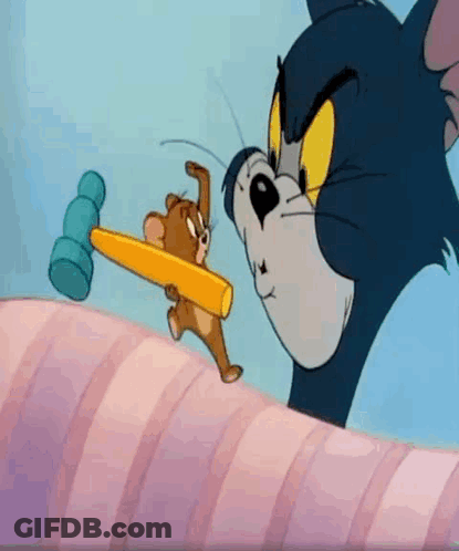 Tom And Jerry Holding Hammers In Mouths GIF