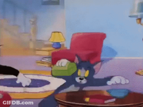 Tom And Jerry In Living Room GIF