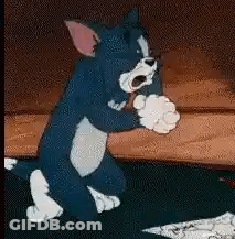 Tom And Jerry Playing With Paper GIF