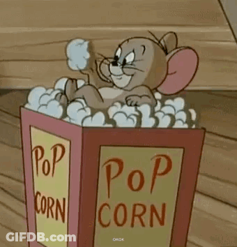 Tom And Jerry Sitting In Popcorn Box GIF