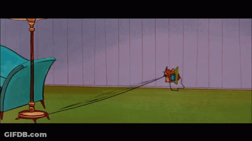 Tom And Jerry Sitting On Couch GIF