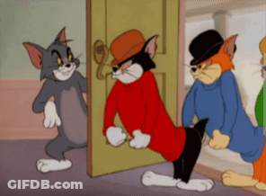 Tom And Jerry Standing In Front Of Door GIF
