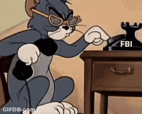 Tom And Jerry Talking On FBI Phone GIF