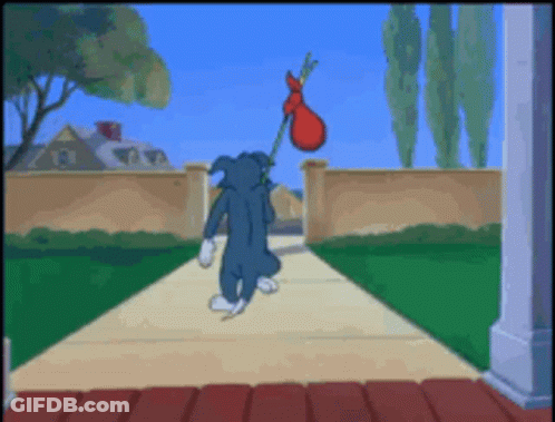 Tom Carrying Red Bag GIF