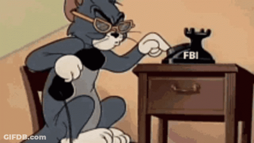 Tom Cat Dialing On Rotary Dial Phone GIF
