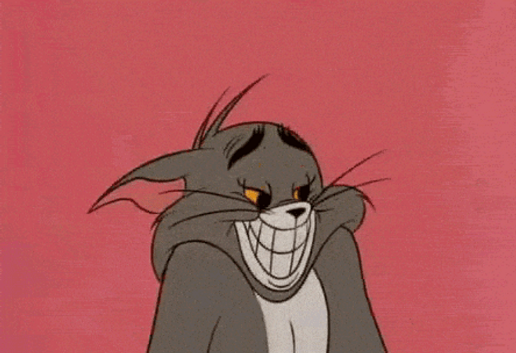 Tom Cat Grinning And Shrugging Shoulders GIF