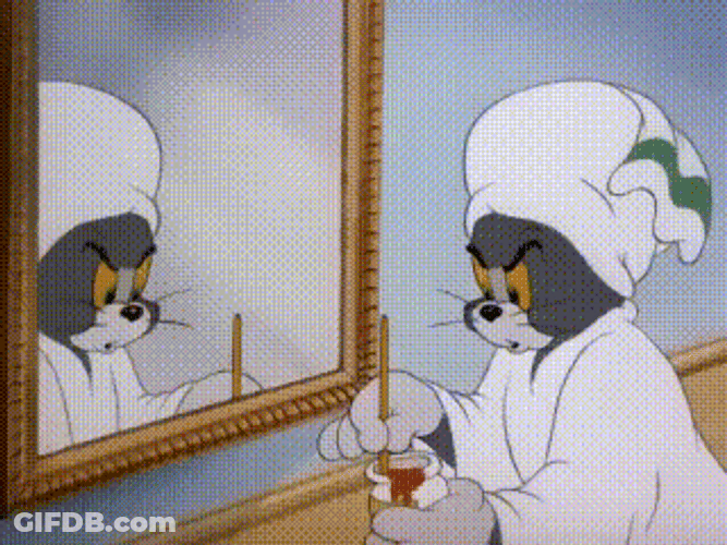 Tom Cat Painting Red Dots On His Face GIF