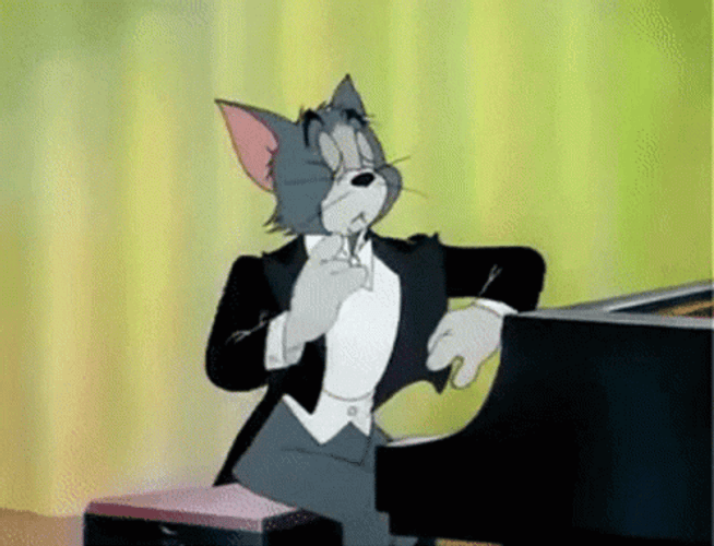 Tom Cat Preparing To Play Piano GIF