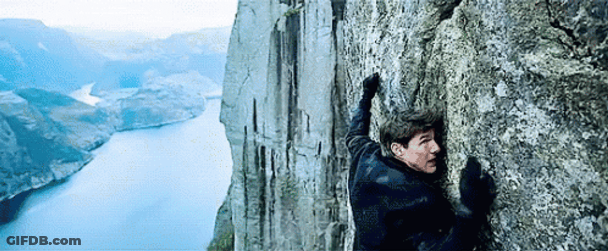 Tom Cruise Cliffhanger Moment In Mission Impossible GIF