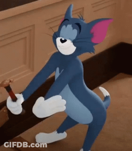 Tom From The Cartoon Tom And Jerry Is Standing On One Leg And Holding A Bottle . GIF