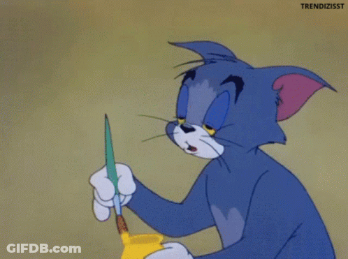 Tom From Tom And Jerry Is Holding A Brush In His Nose GIF