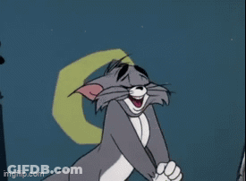 Tom From Tom And Jerry Is Laughing In Front Of A Squirrel GIF