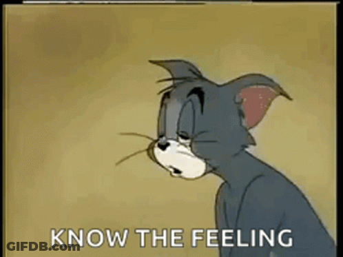 Tom From Tom And Jerry Sitting Down Looking Down GIF