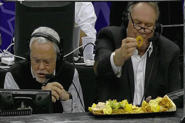 Tom Heinsohn And Mike Gorman Eating Nacho GIF