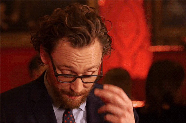 Tom Hiddleston Fixing Glasses GIF