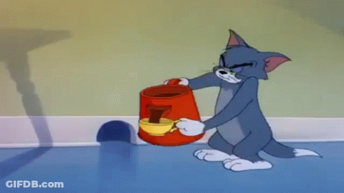 Tom Holding Coffee Can And Cup GIF