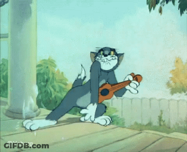 Tom Playing Guitar GIF