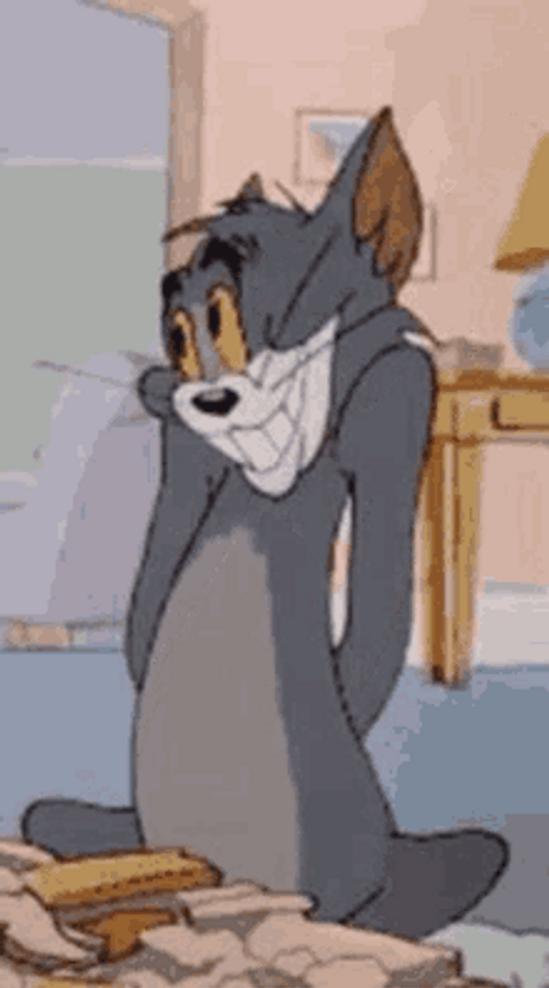 Tom Shy Face GIF