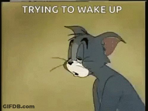 Tom Trying To Wake Up GIF