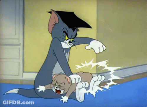 Tom Wearing Graduation Cap On Top Of Jerry GIF