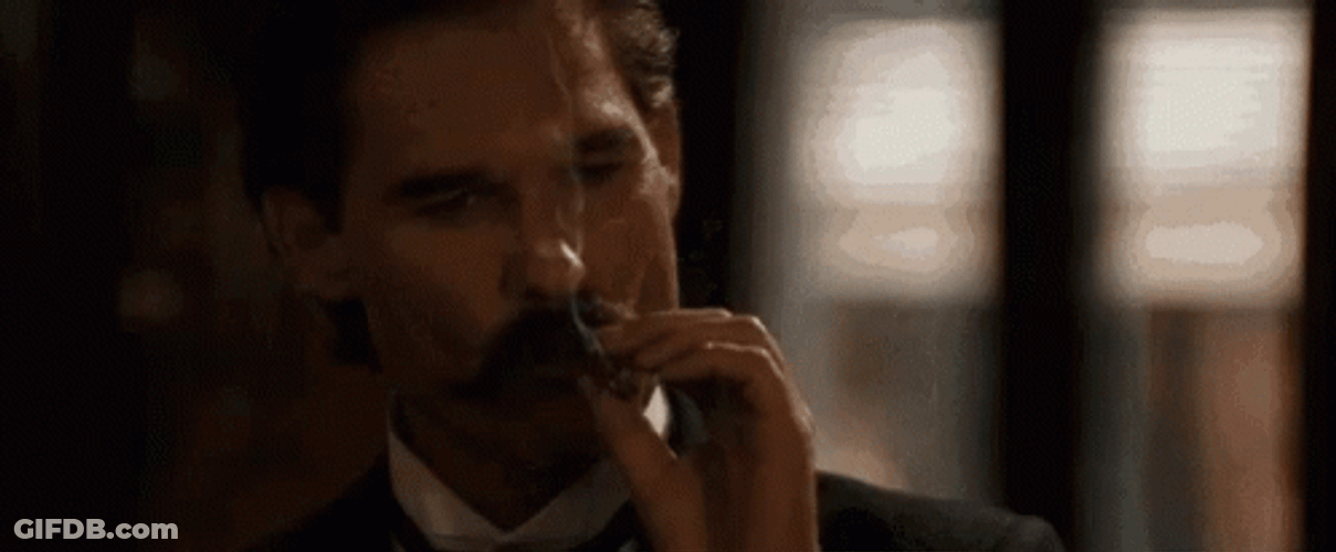Tombstone Kurt Rusell Smoking GIF