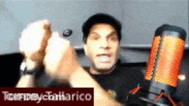 Tommy Tallarico Giving High Five In Front Of Microphone GIF