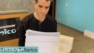 Tommy Tallarico Holding Stack Of Paper GIF