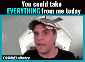 Tommy Tallarico Is Wearing A Shark Hat And Talking To The Camera GIF