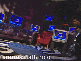 Tommy Tallarico Laying On Floor With Legs Crossed GIF