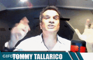 Tommy Tallarico On Screen With Hands In Air GIF